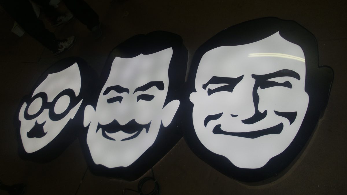Pep Boys face logo signage