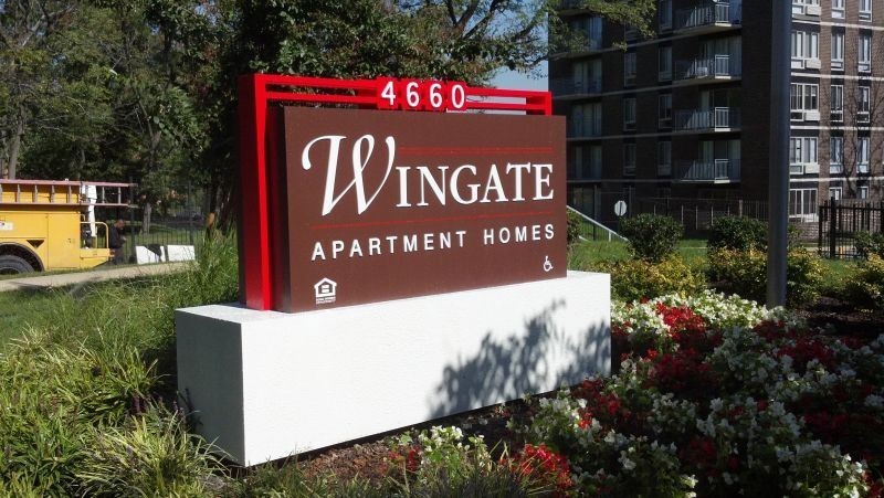 Wingate Apartment sign side view